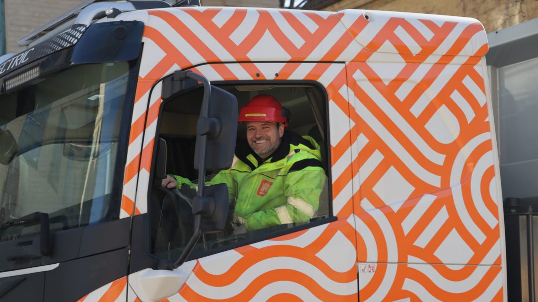 Lars Fredrik Moe-Helgesen is in the driver’s seat of an electric truck.